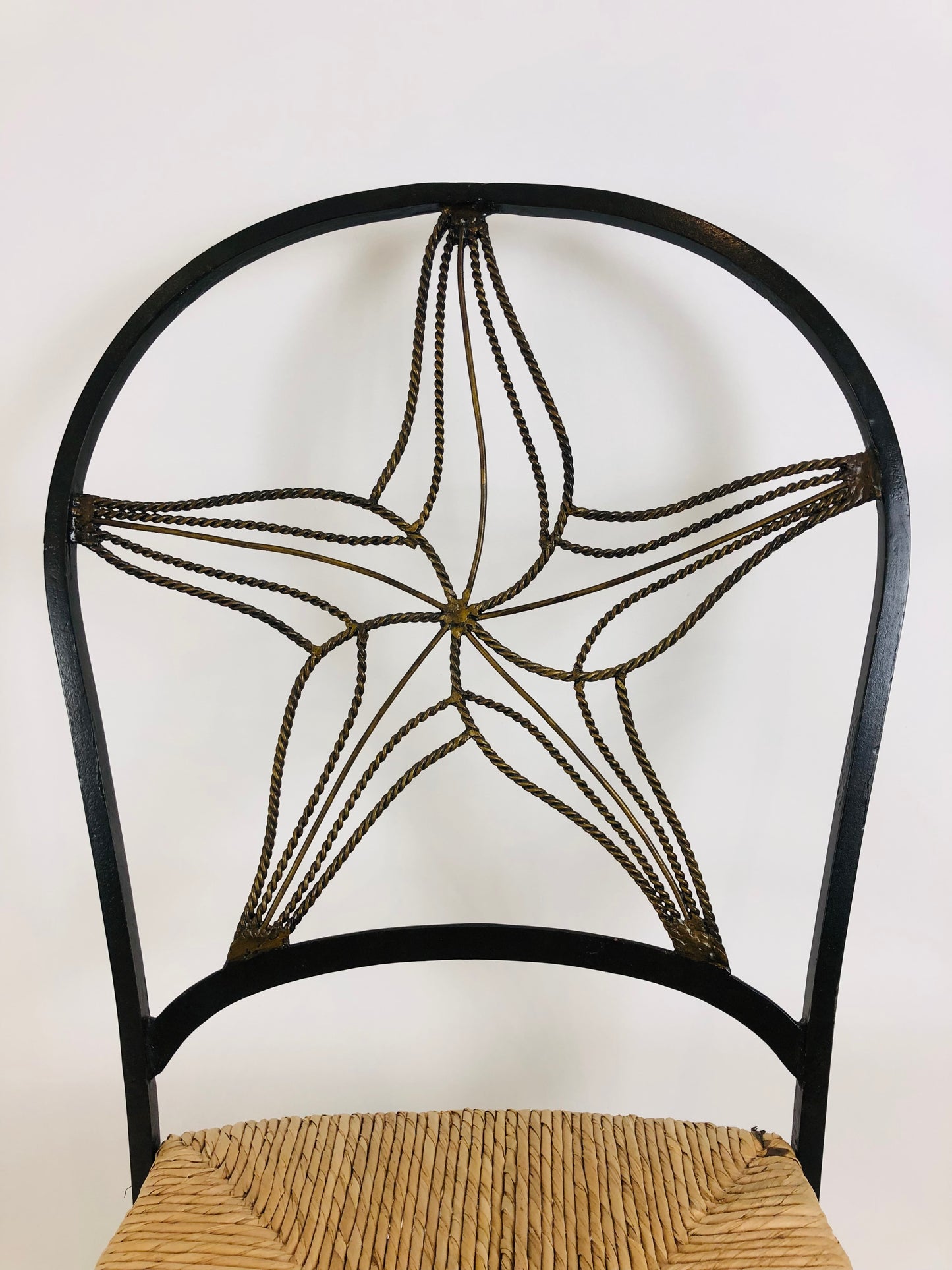 A PAIR OF WROUGHT IRON 'STARFISH' DESIGN CHAIRS