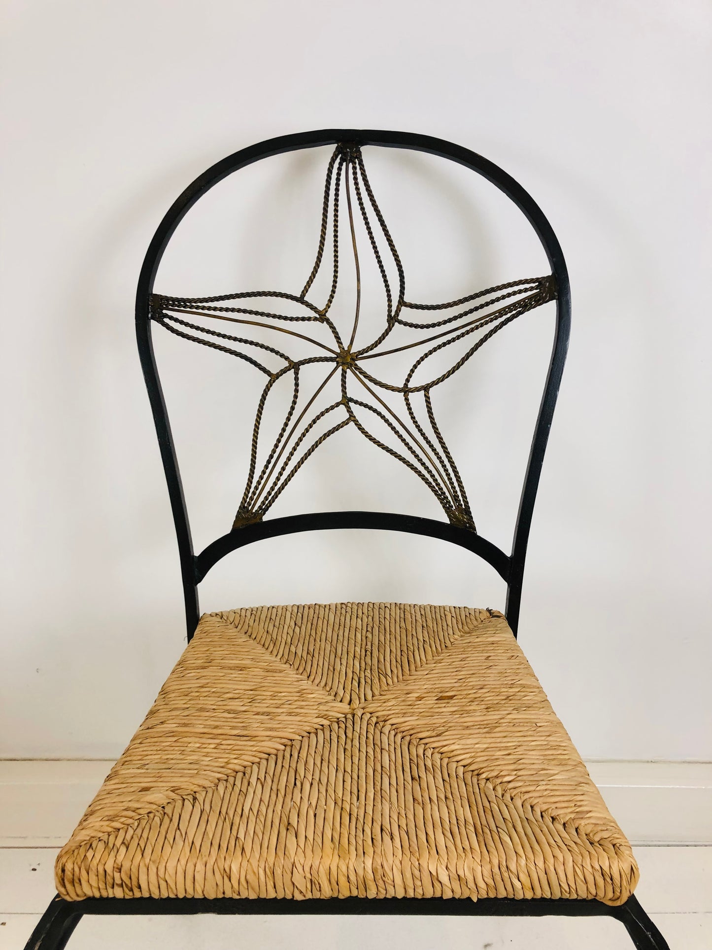 A PAIR OF WROUGHT IRON 'STARFISH' DESIGN CHAIRS