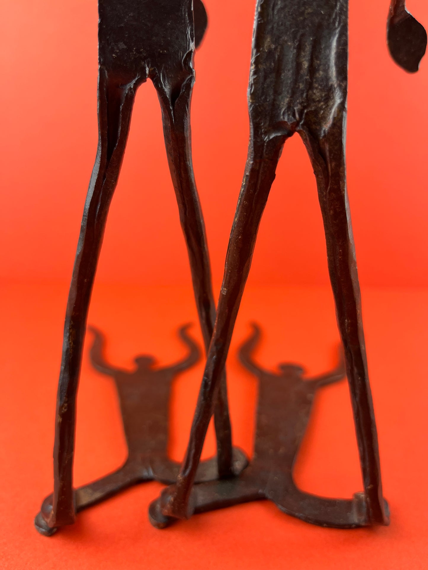 WROUGHT IRON DOGON FIGURAL BOOKENDS