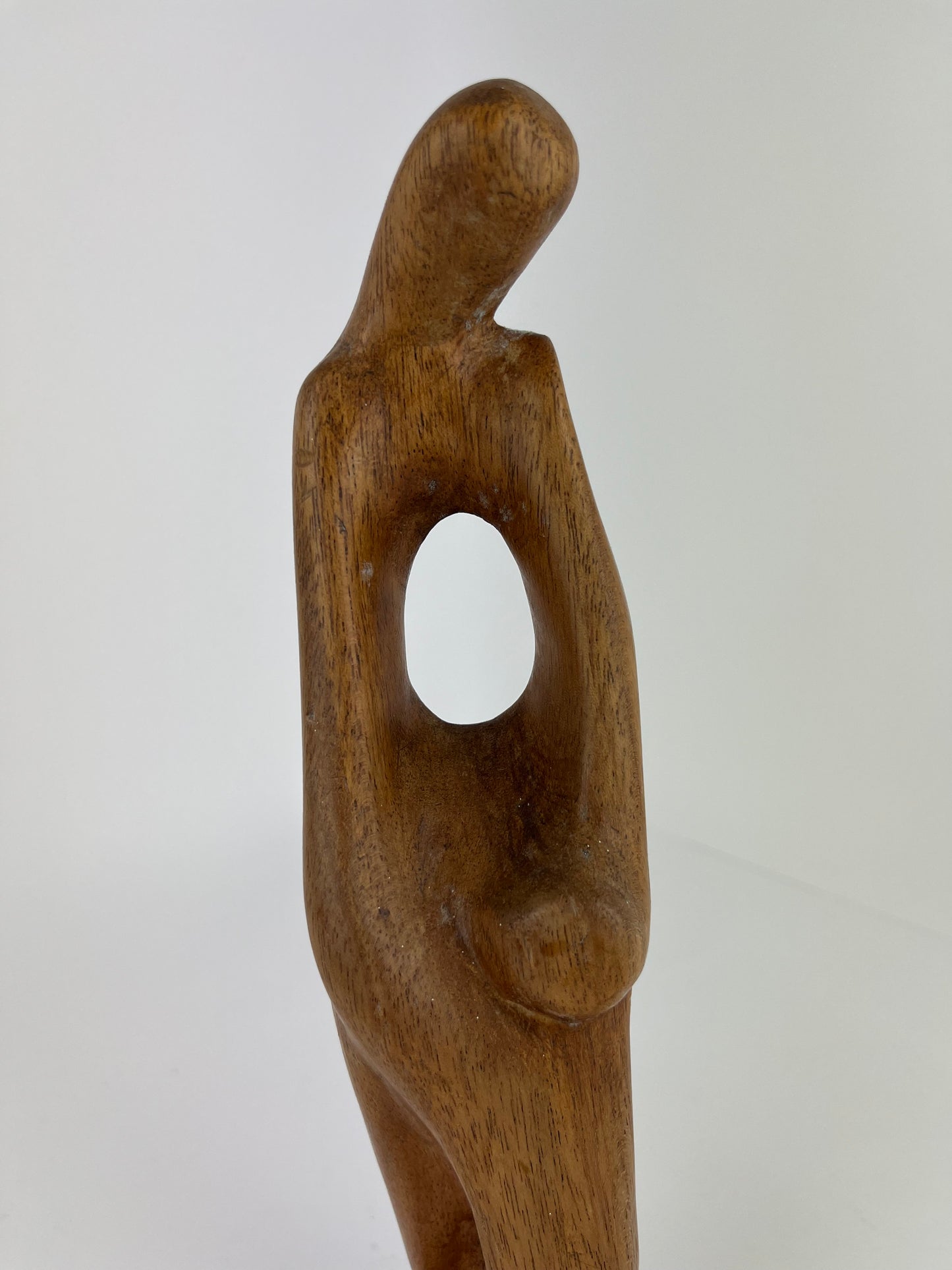 CARVED PARENT AND CHILD WOODEN SCULPTURE