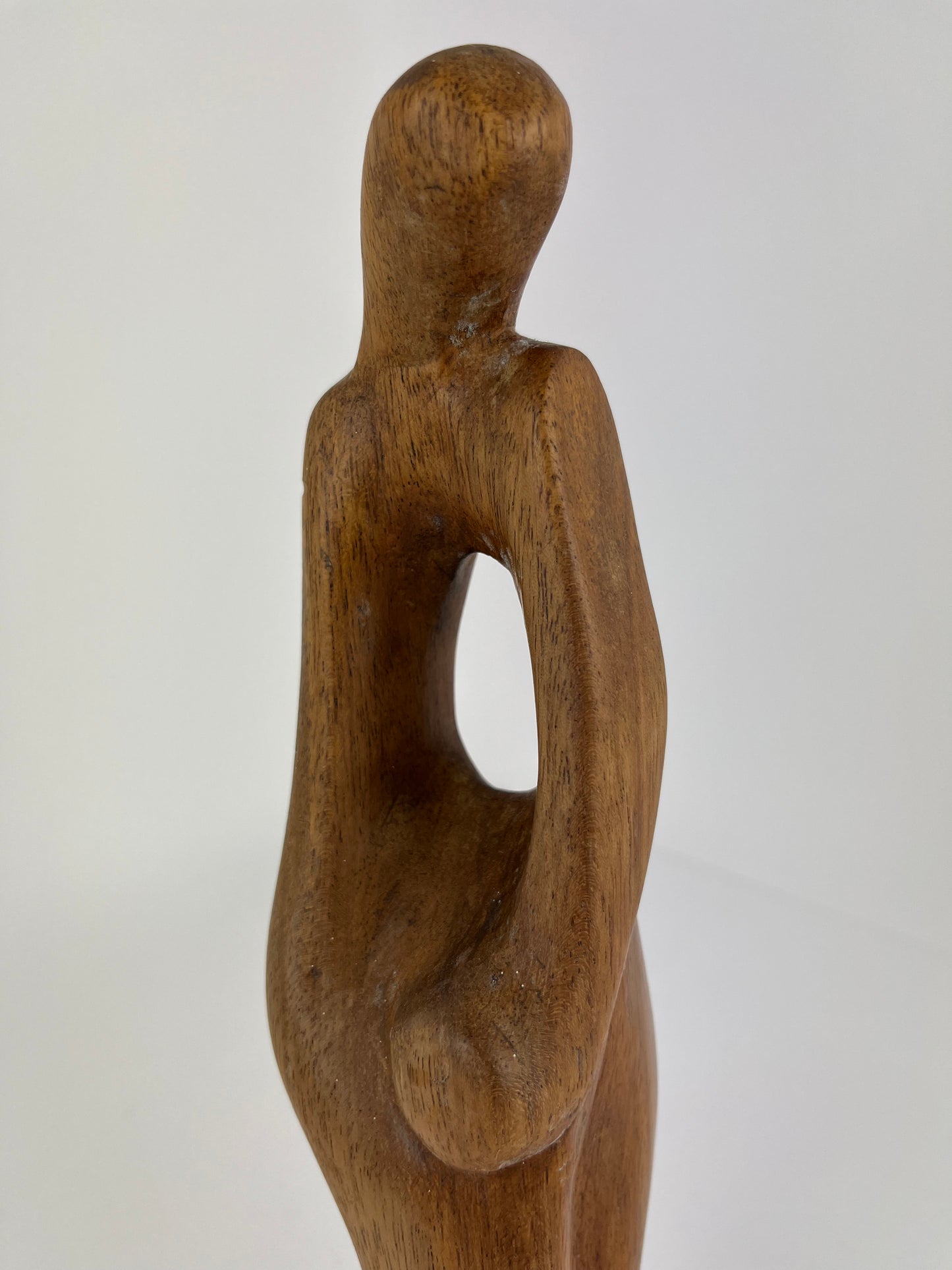 CARVED PARENT AND CHILD WOODEN SCULPTURE