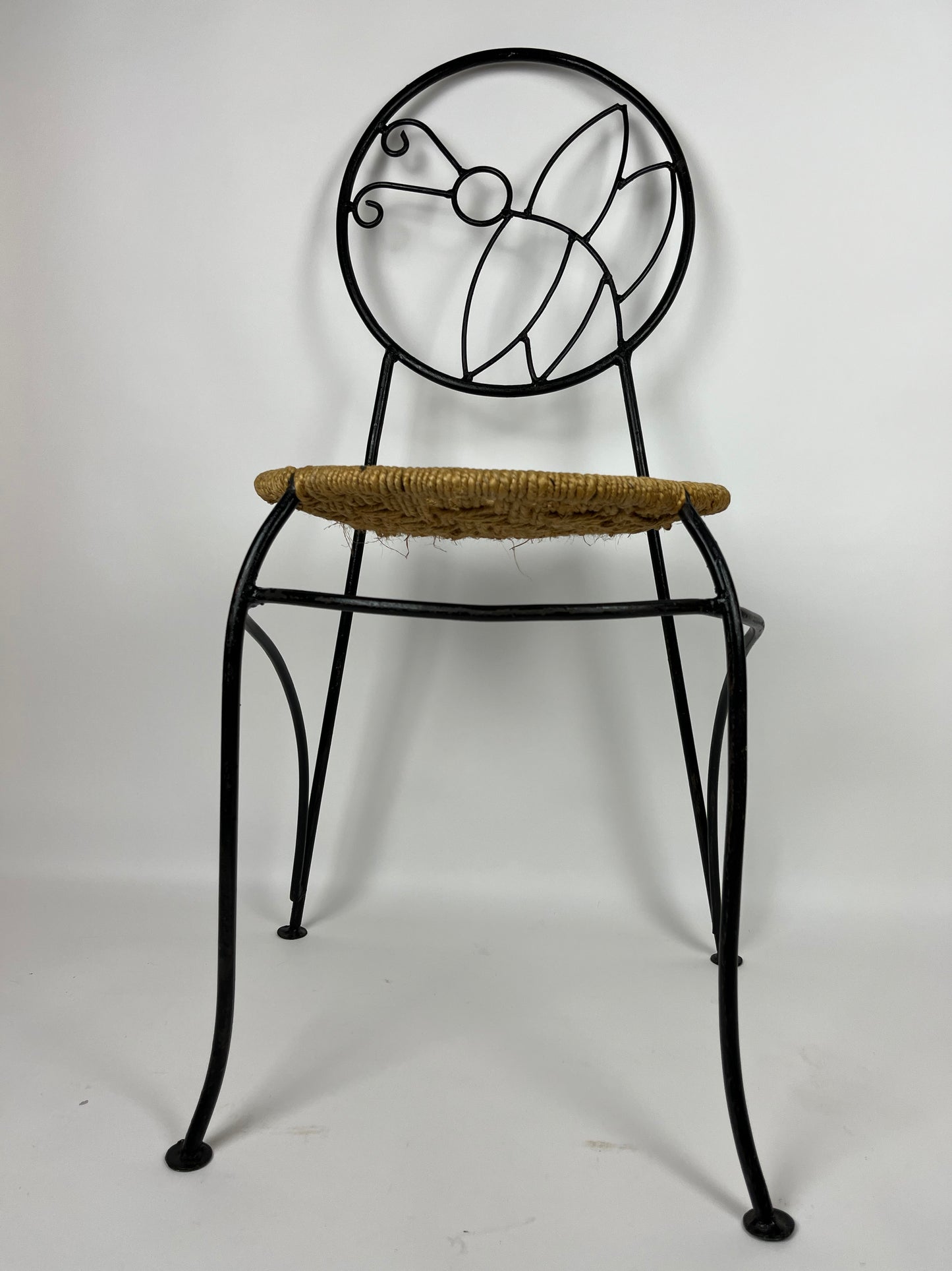 A PAIR OF WROUGHT IRON 'BUTTERFLY' DESIGN CHAIRS